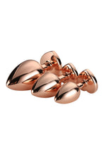 Carregar imagem no visualizador da galeria, Conjunto de 3 plugs anais em metal rosa com brilhantes em coração - Rose gold plug set - Dream Toys
