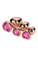 Carregar imagem no visualizador da galeria, Conjunto de 3 plugs anais em metal rosa com brilhantes em coração - Rose gold plug set - Dream Toys
